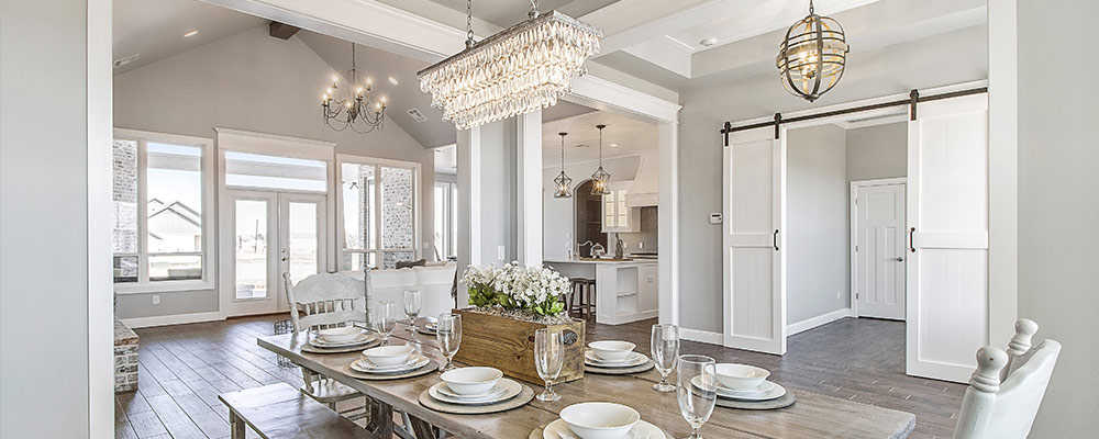 Modern country dinning room with integrated mood lighting system managed with a Lutron lighting control system